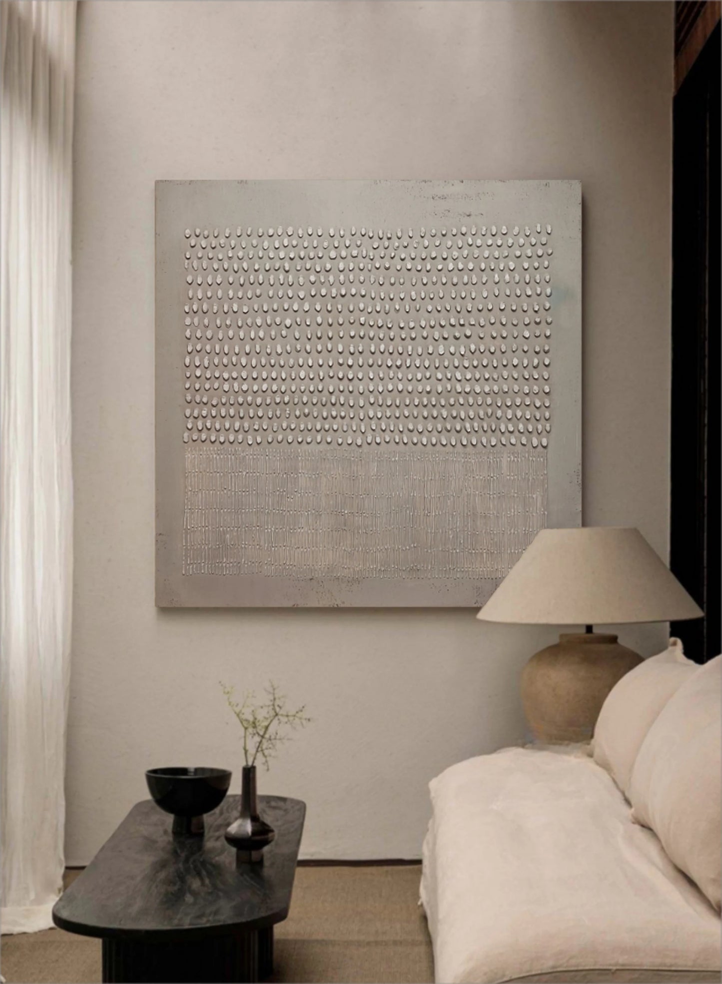Contemporary hand-painted canvas shown above modern furniture.