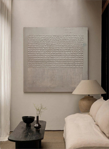Contemporary hand-painted canvas shown above modern furniture.